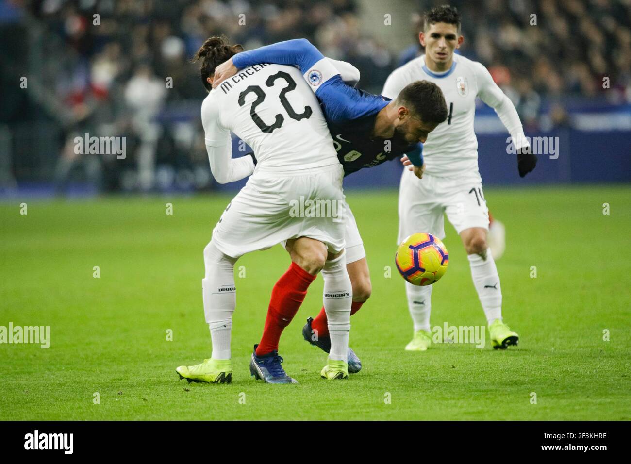France's Olivier Giroud (L) vies with Uruguay's Martin Caceres (R) during the 2018 FIFA Friendly Game football match between France and Uruguay on November 20, 2018 at Stade de France in Saint-Denis, France - Photo Geoffroy Van Der Hasselt / DPPI Stock Photo