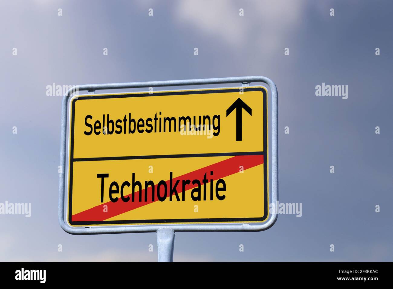 Symbol image: German town-sign with the letters Technokratie / Selbstbestimmung (Technocracy / Self-determination) Stock Photo