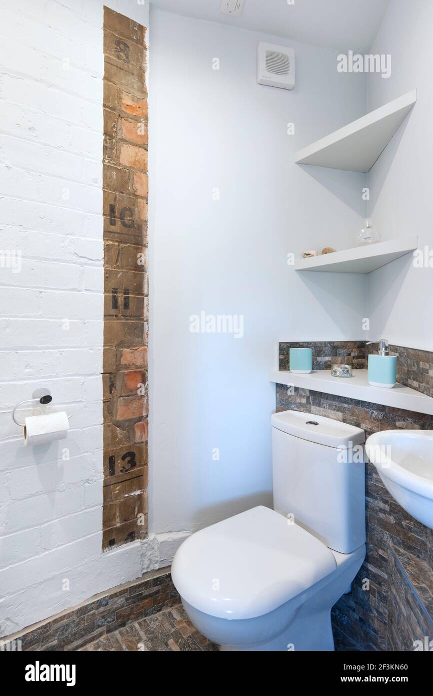 Bedroom 1 en suite shower room. Original depth markings on the wall