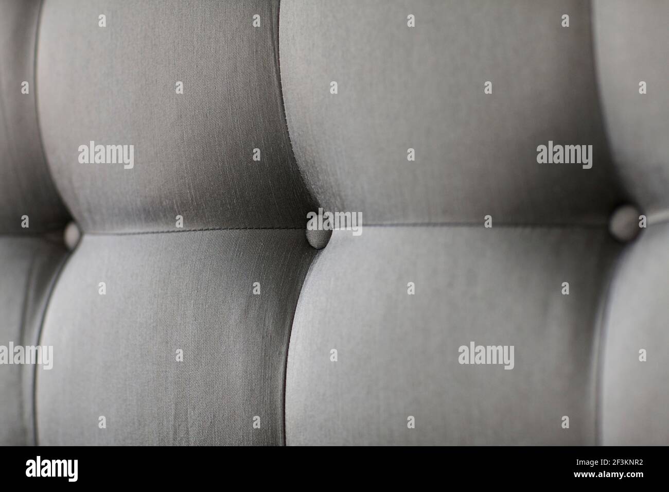 Gold quilted headboard Stock Photo