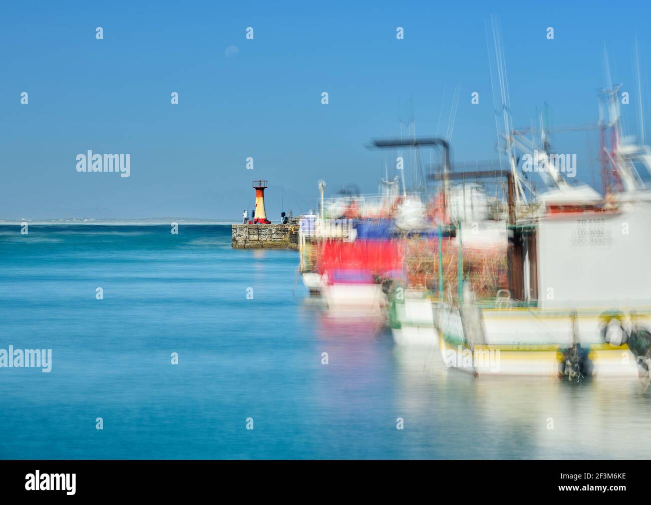Fishing boats moored up in Kalk Bay Harbour, Cape Town Stock Photo