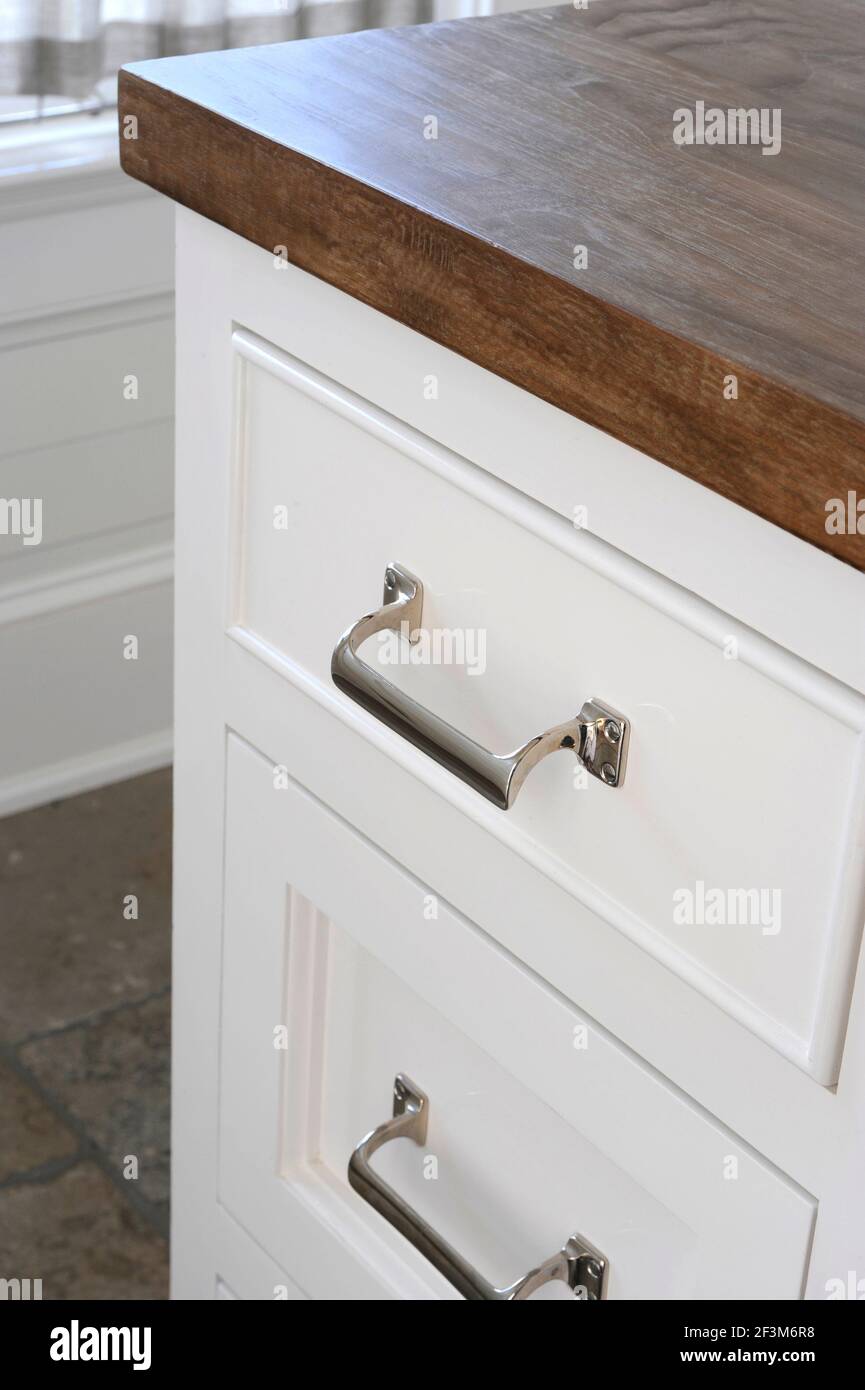 Metal drawer handles in kitchen of beach house in Campo Cove in Loma Linda, California, USA Stock Photo