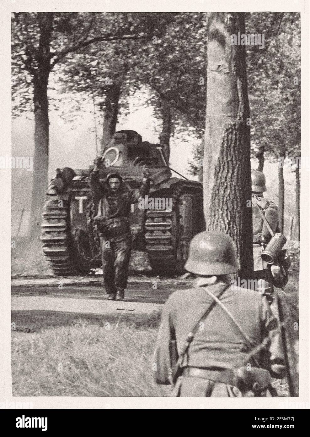 World War II period from German propaganda news. Battle of France. Surrender of French tank screw. 1940 Stock Photo
