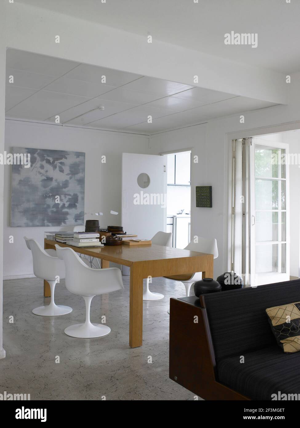 Open plan dining table and chairs in living room, Singapore Stock Photo