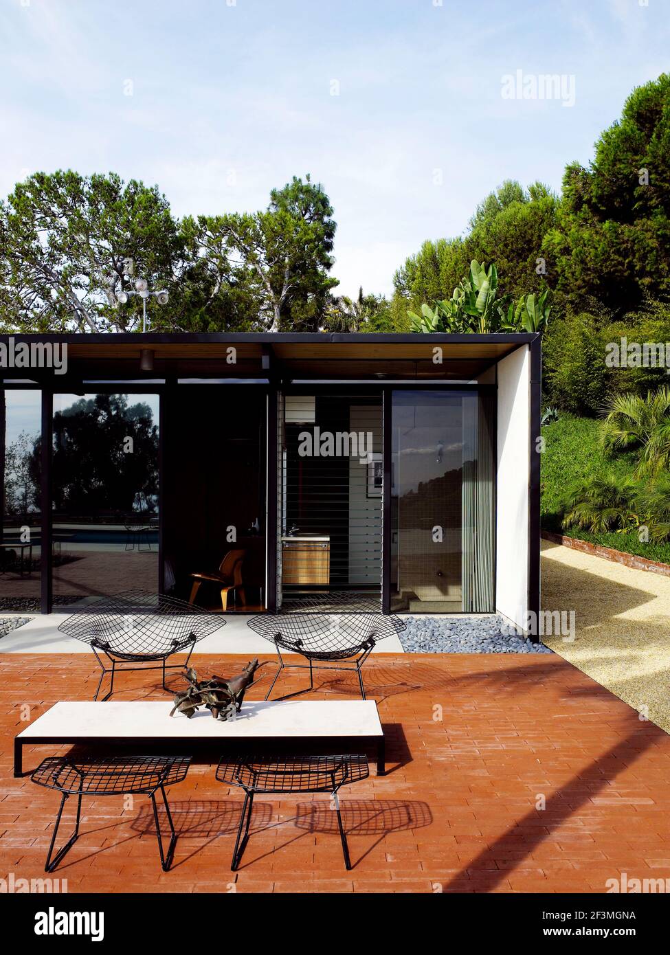 Table and chairs on terrace of Malibu home, California, USA Stock Photo