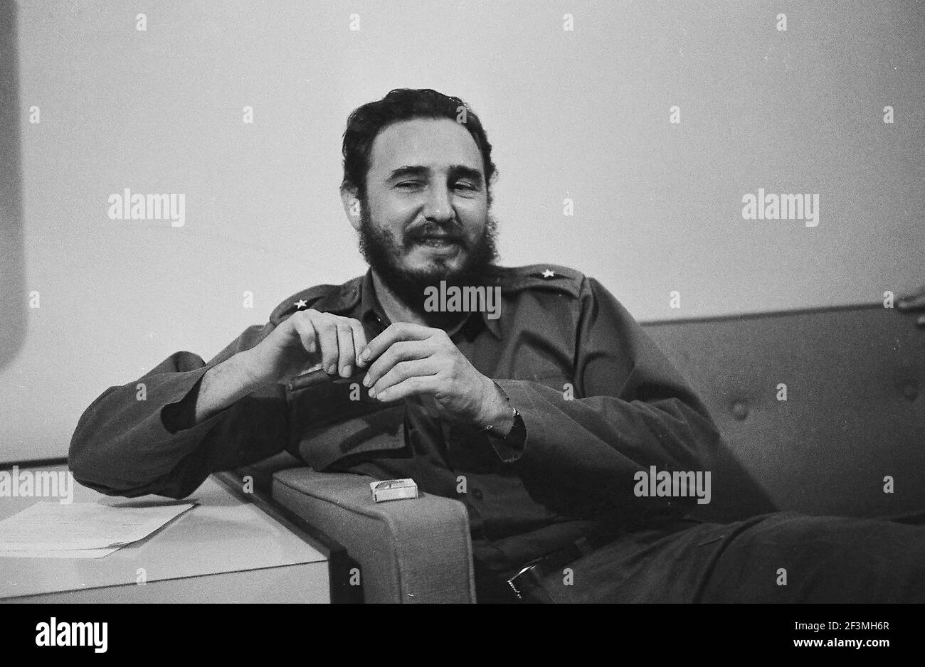 Fidel Castro in room at the Habana Libre Hotel, smoking cigar, Havana (Cuba : Province), Havana (Cuba), Cuba, 1963. From the Deena Stryker photographs collection Stock Photo - Alamy