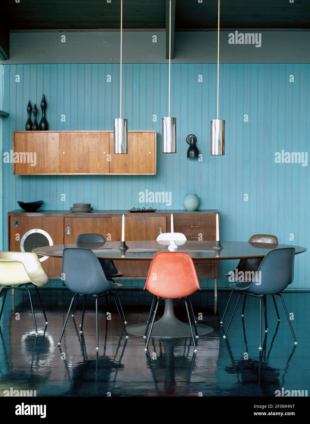 Vintage dining table with pendant lights and sideboards in Mulholland