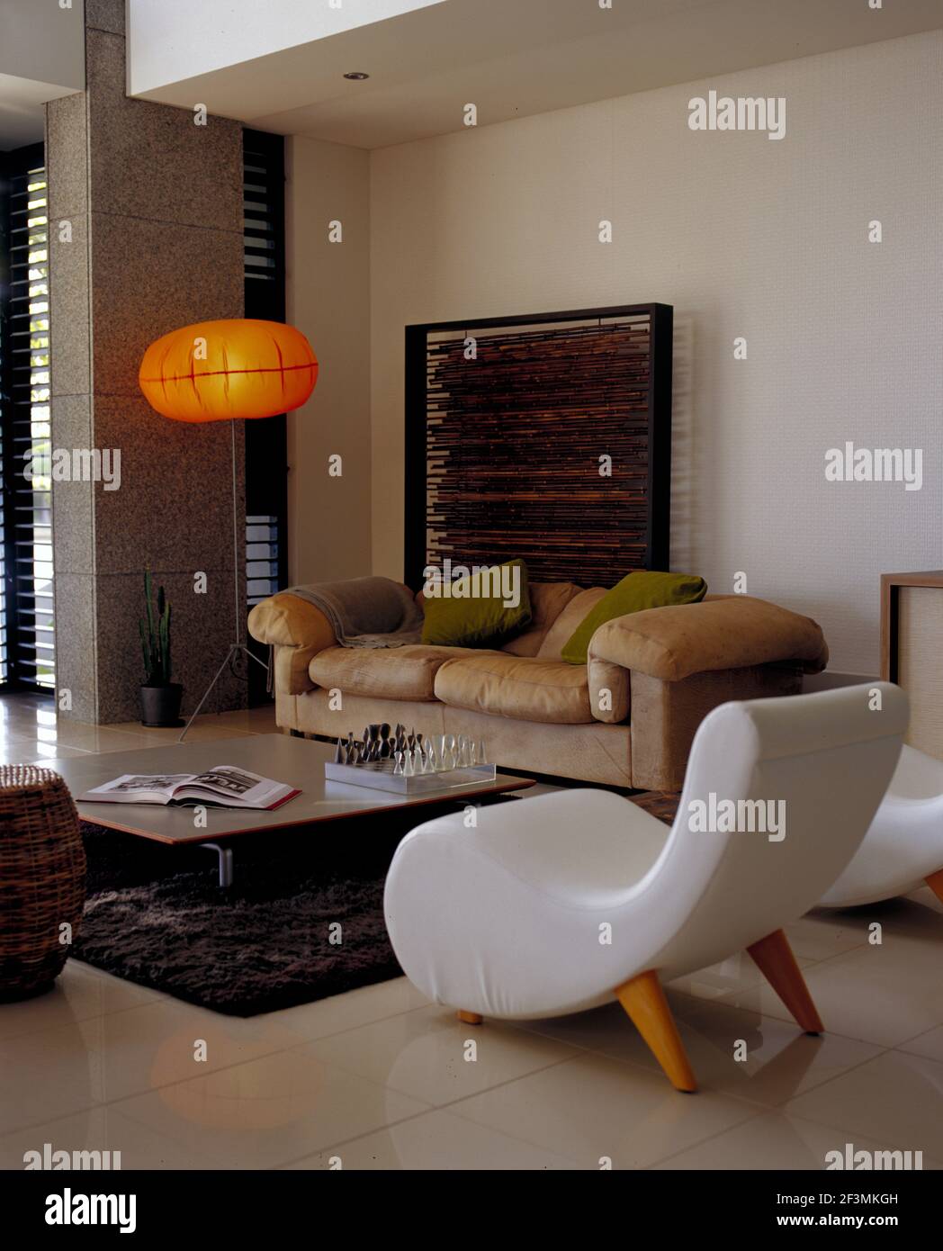 Seating around coffee table in modern living room, Australia Stock