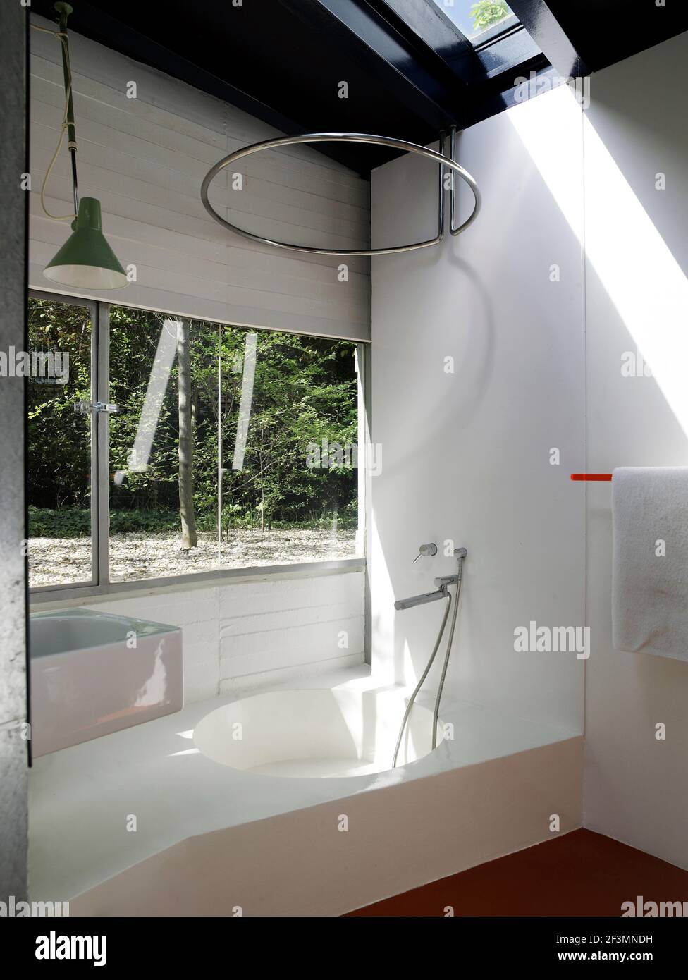 Shower in white bathroom in Spanish home Stock Photo Alamy