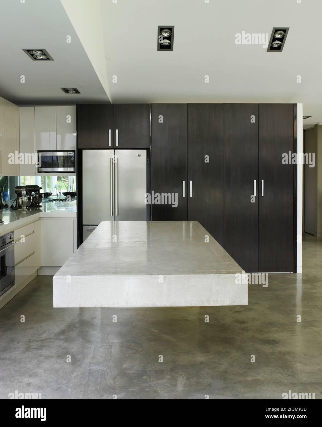 Freestanding breakfast bar in kitchen in Australian home Stock Photo