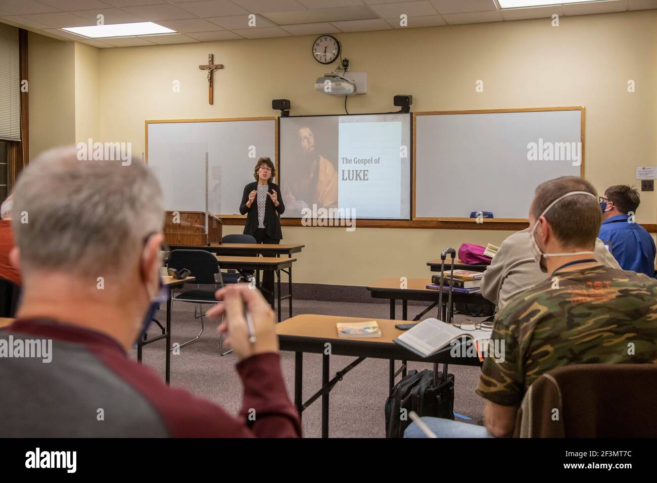 Detroit, Michigan - Dr. Mary Healy, professor of Sacred Scripture at Sacred Heart Major Seminary, teaches a class to deacon candidates on the Synoptic Stock Photo
