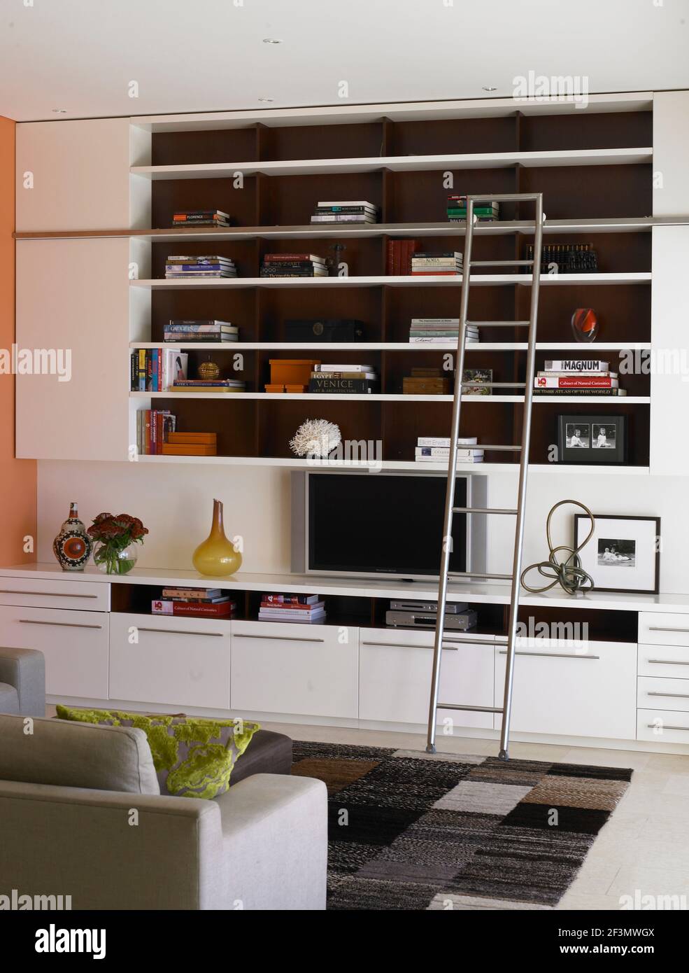 Sofa facing television in modern living room, Australia Stock Photo Alamy