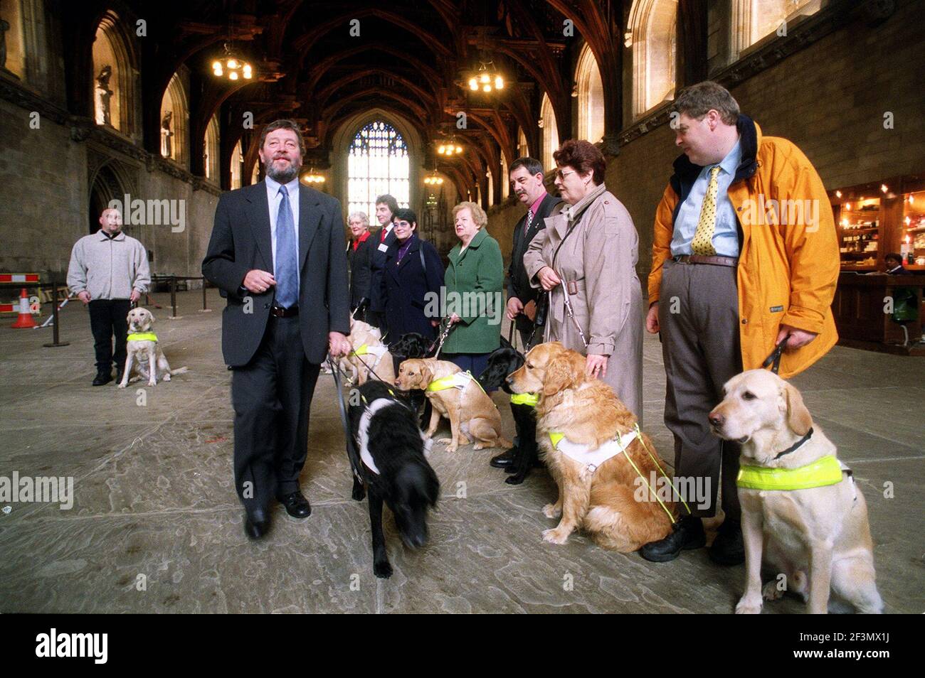 David Blunkett Guide Dogs For the Blind Association March 2001The guide dogs for the blind assocition held a reception at the House of Commons  to celebrate the introduction of section 37 of the disability discrimination act 1995 which requires licensed taxi drivers to carry guide dogs in their car  David Blunkett MP and Education secretary with his guide dog Lucy seen here meeting some of the association members and their dogs in the House of Commons Stock Photo