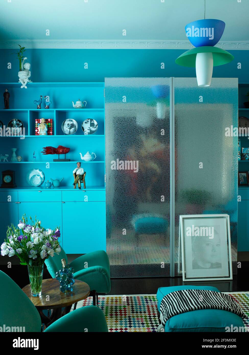 Blue display unit and seating in Australian home Stock Photo Alamy