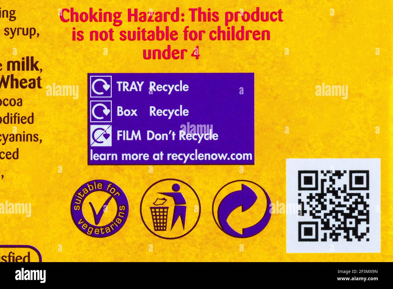 Recycling information and suitable for vegetarians symbol on box of Cadbury Mini Eggs Nest Cakes - choking hazard Stock Photo