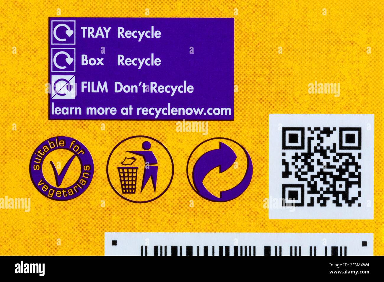 Recycling information and suitable for vegetarians symbol on box of Cadbury Mini Eggs Nest Cakes - disposal recycling recycle logo symbol Stock Photo