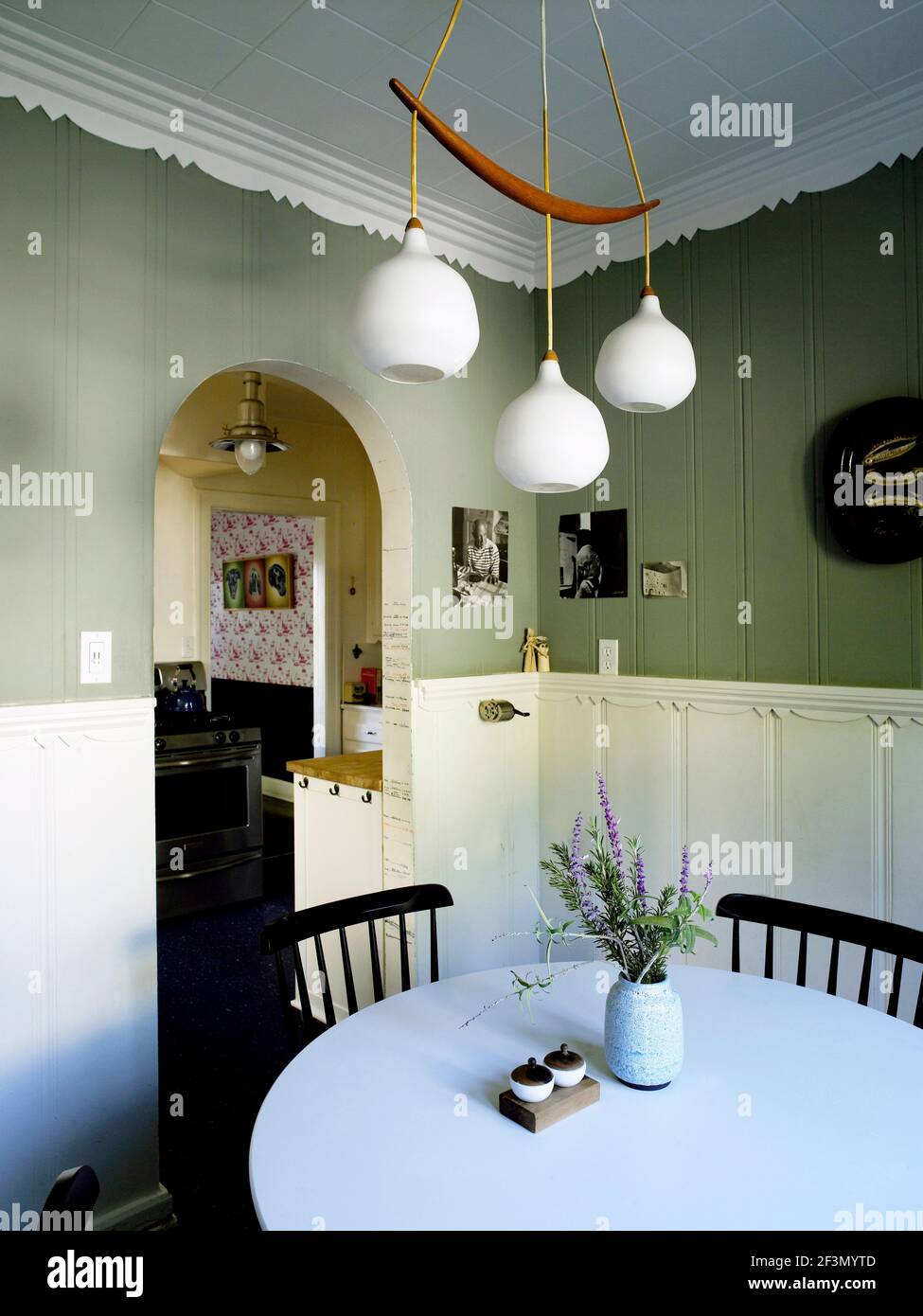 Pendant light above table in dining room in USA home Stock Photo - Alamy