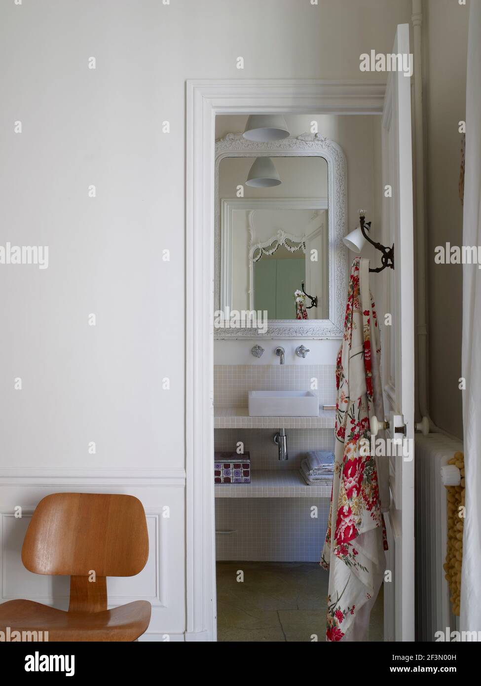 View through open door to bathroom in French home Stock Photo Alamy