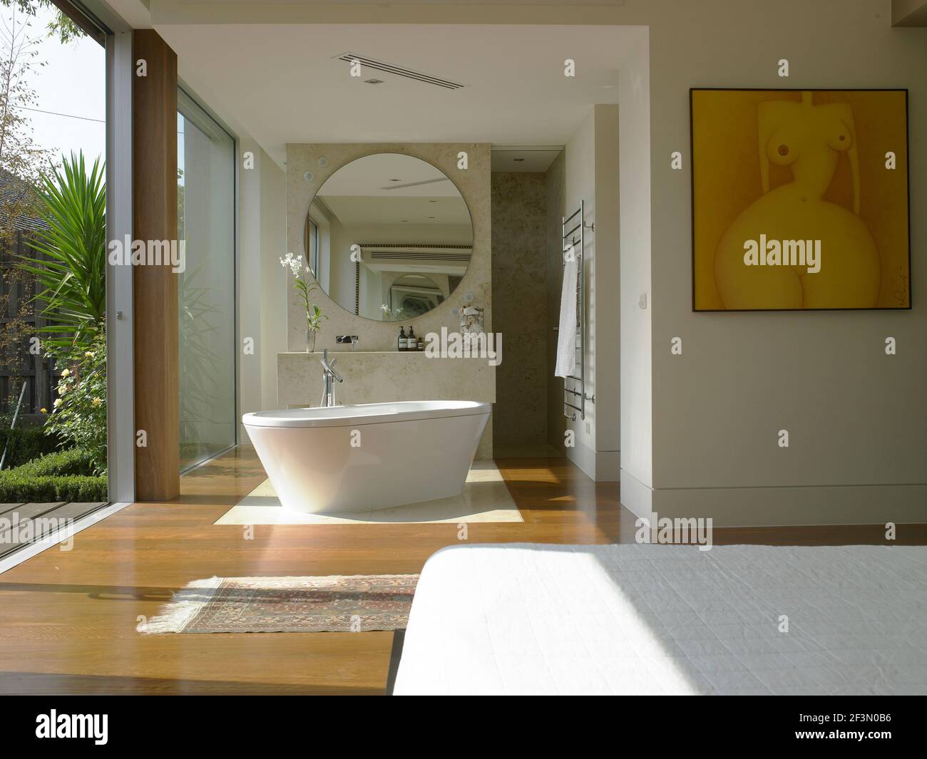 Freestanding bathtub in bedroom in Australian home Stock Photo Alamy