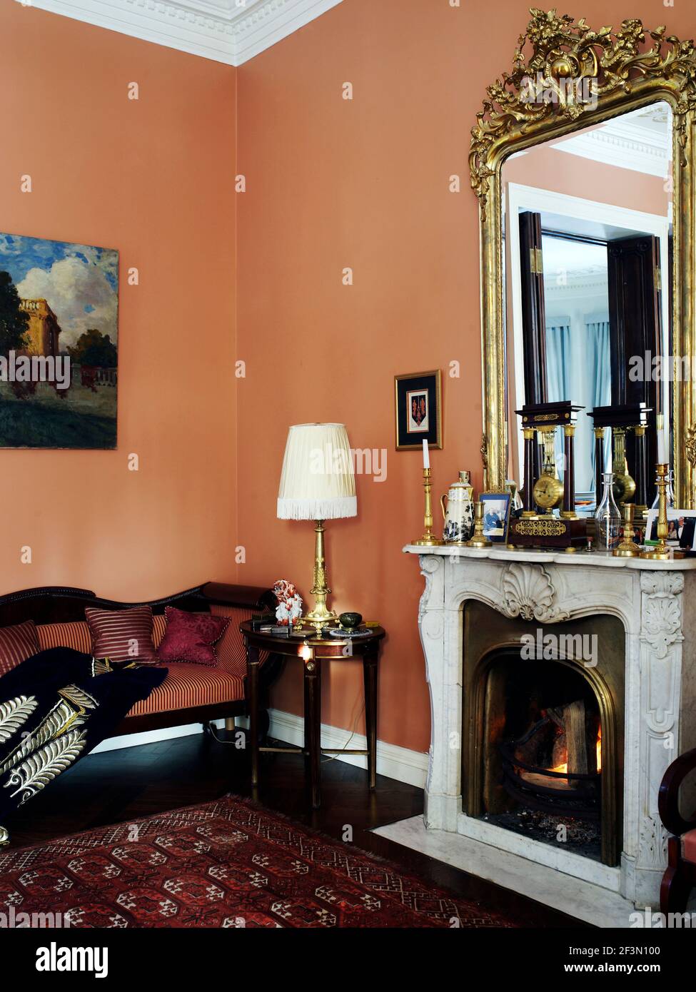 Gilt mirror above fireplace in hi-res stock photography and images - Alamy