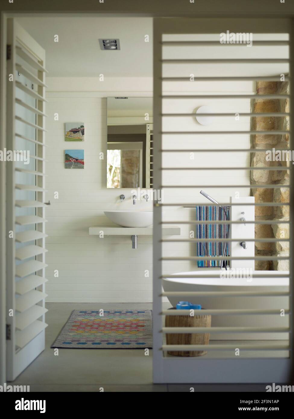 View through doorway to bathroom in Australian home Stock Photo