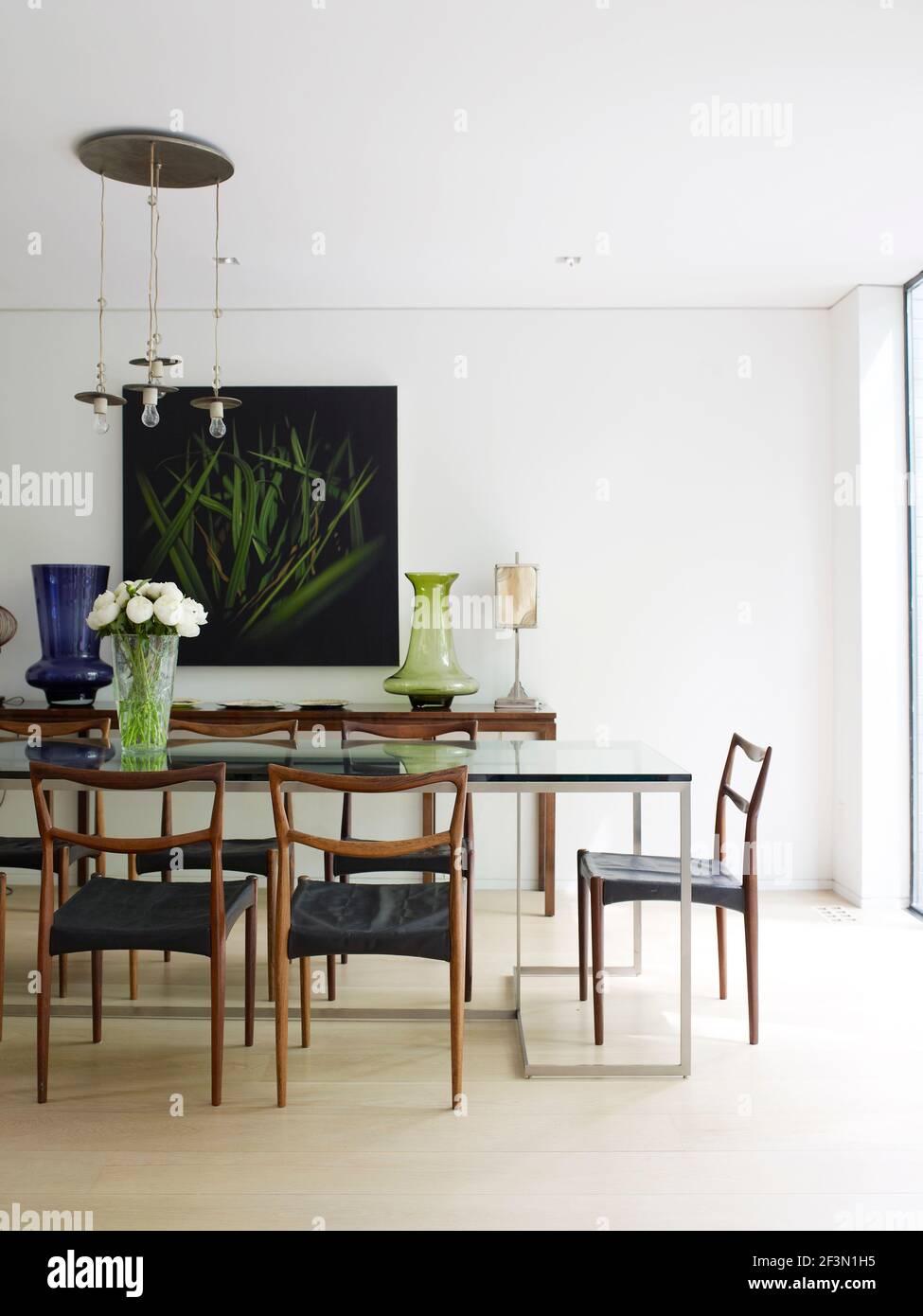 Table and chairs in light dining room in Canadian home Stock Photo Alamy