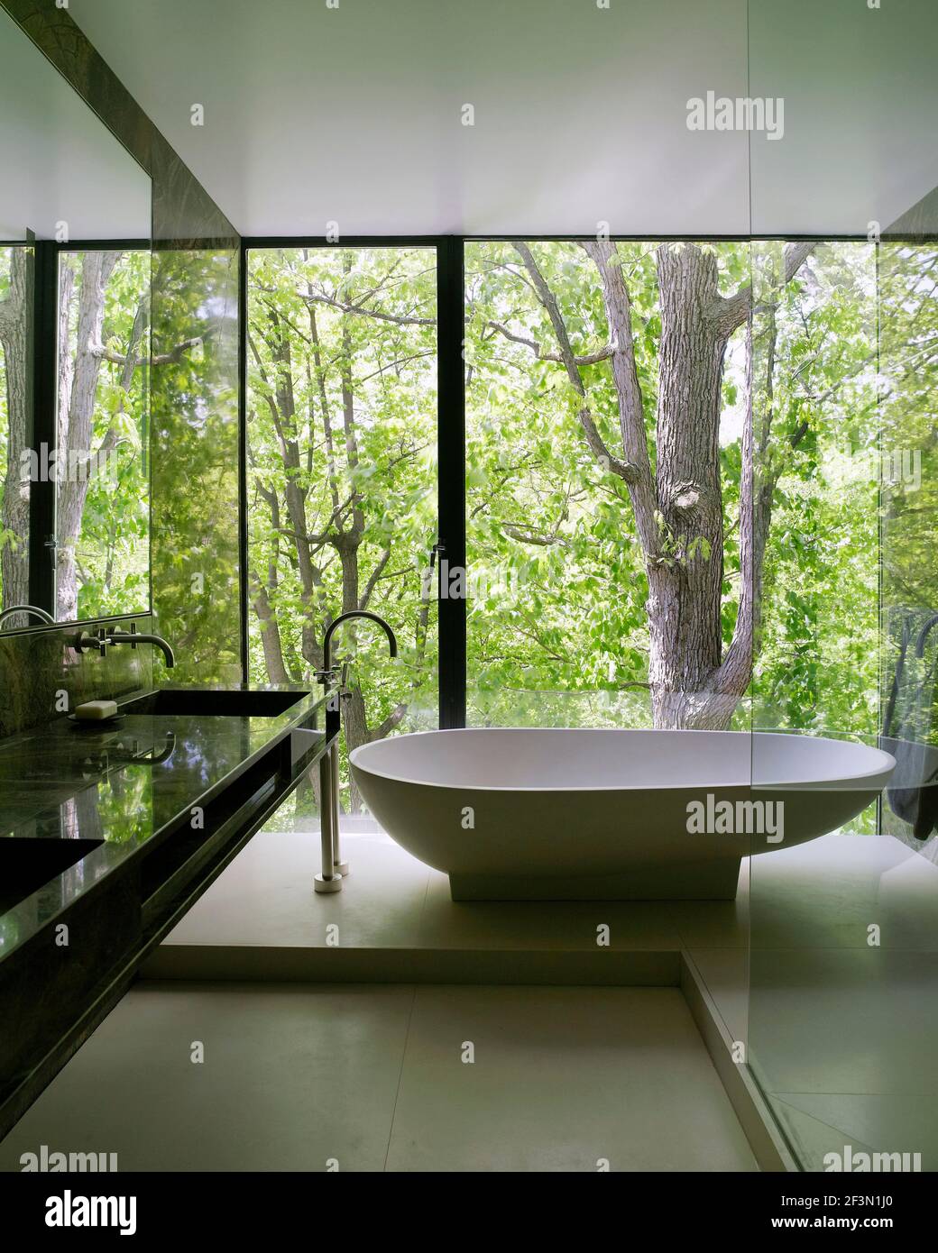 Freestanding bathtub in bathroom of Canadian home Stock Photo Alamy