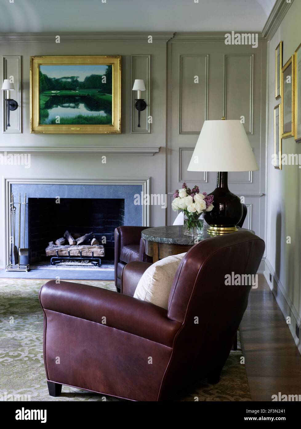 Brown leather armchair in living room of Shelley Morris Designed