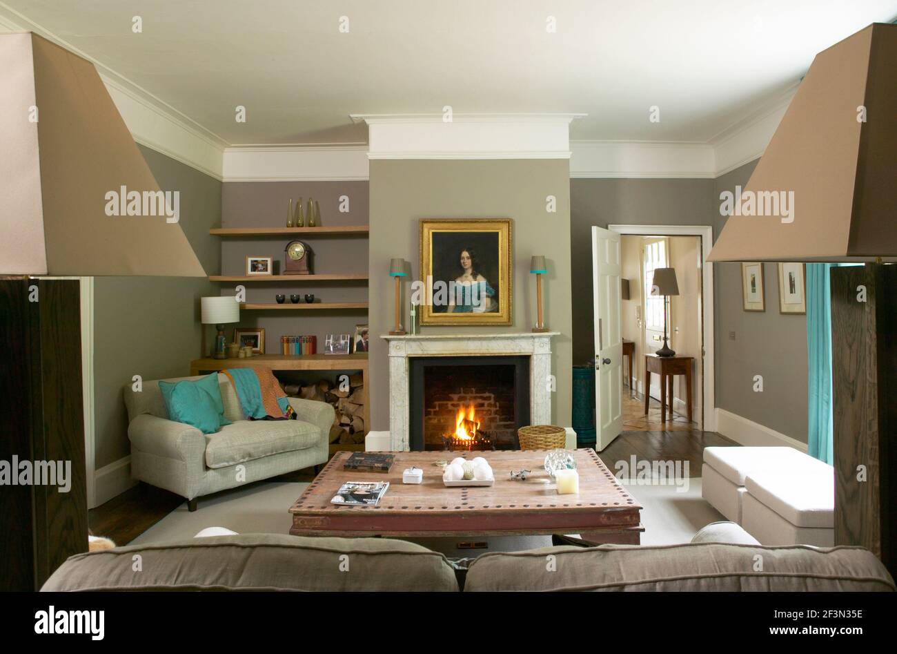 Sitting room with open fire Stock Photo