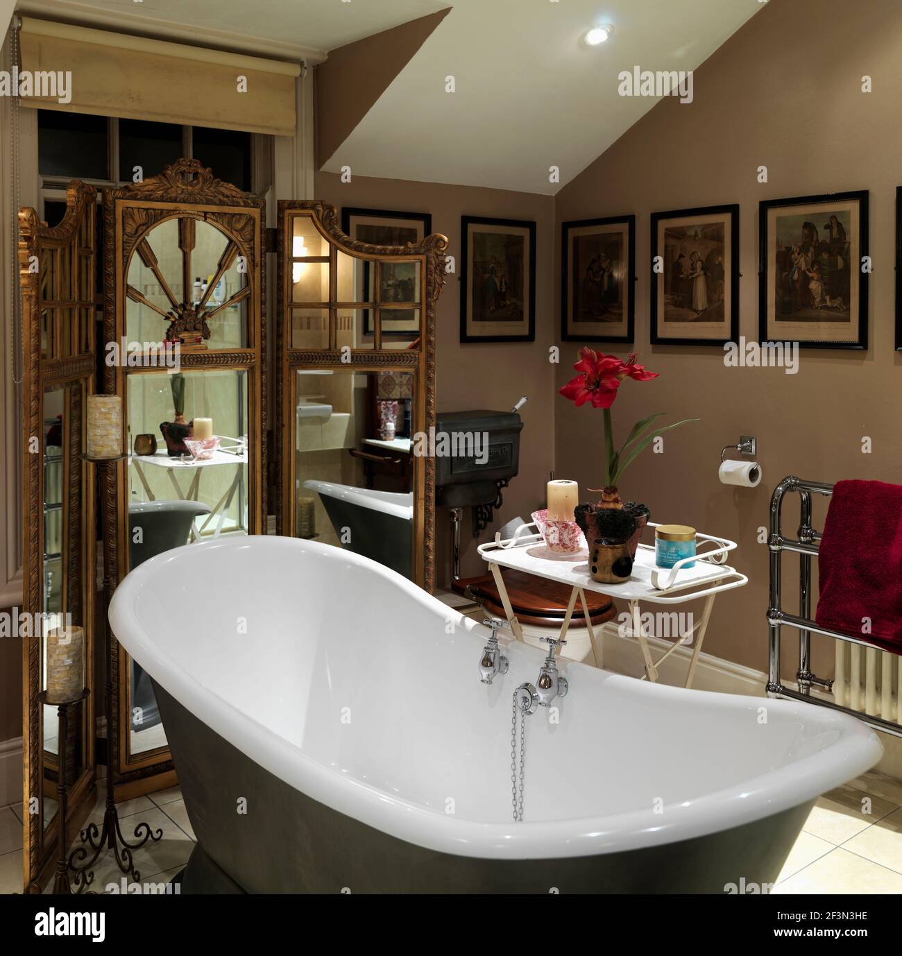 Freestanding bathtub in traditional bathroom, UK home Stock Photo Alamy