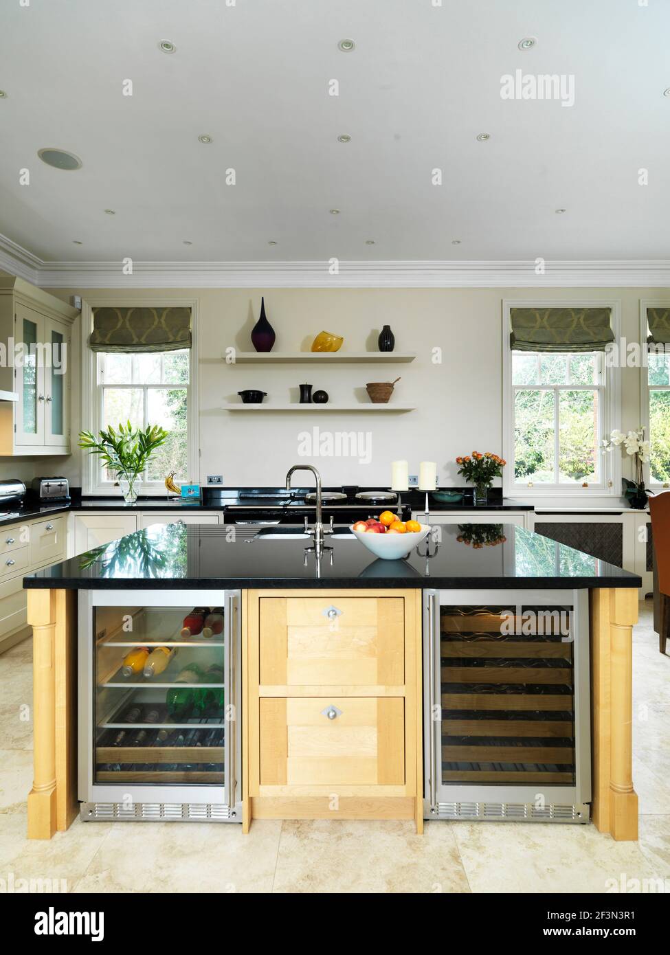 Island unit in modern kitchen, UK home Stock Photo