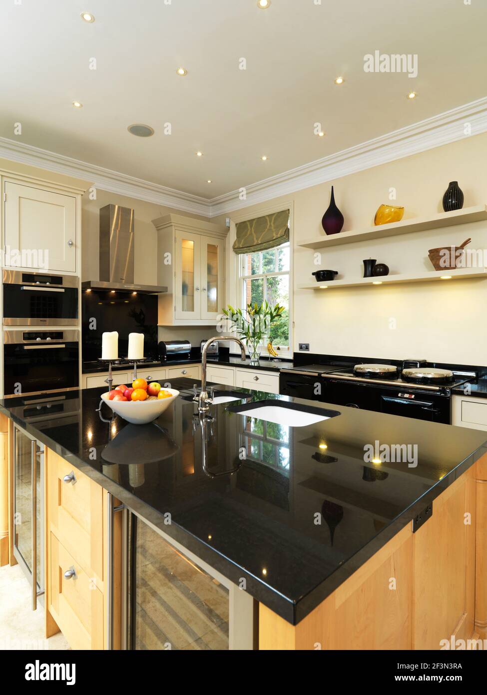 Island unit in modern kitchen, UK home Stock Photo