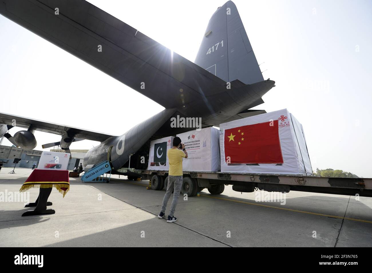 (210317) -- ISLAMABAD, March 17, 2021 (Xinhua) -- A handover ceremony is held for the second batch of COVID-19 vaccines donated by the Chinese government at Noor Khan Air Base near Islamabad, capital of Pakistan, March 17, 2021. (Xinhua/Ahmad Kamal) Stock Photo