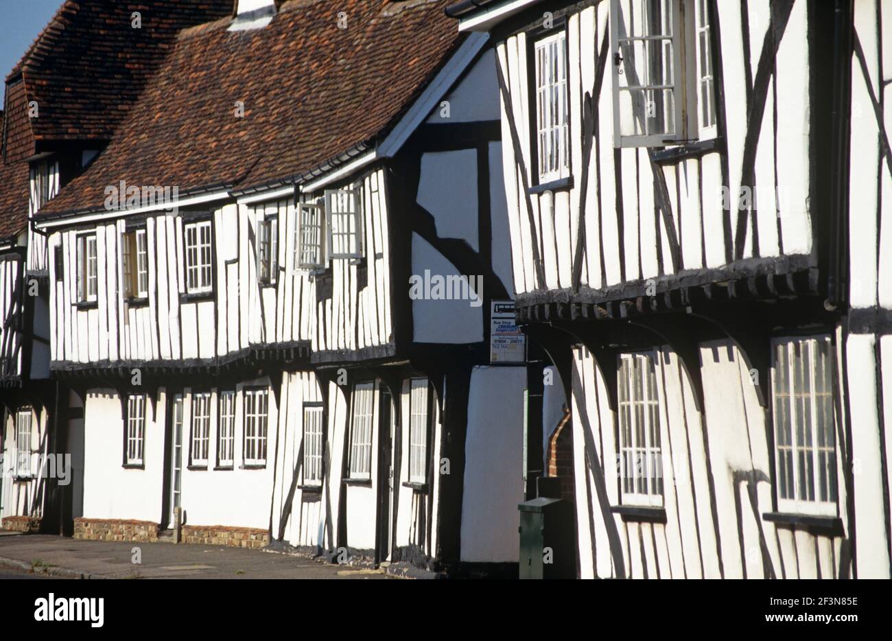 Elstow village has historic medieval houses with timber frames, lathe and plaster exteriors, and a second storey overhang in the traditional style of Stock Photo