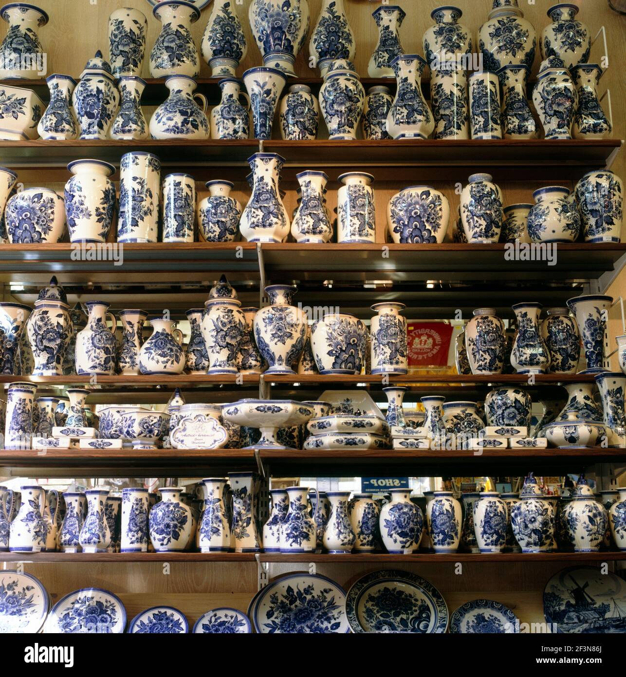 A display of traditional blue and white delft pottery in the typical traditional style of the