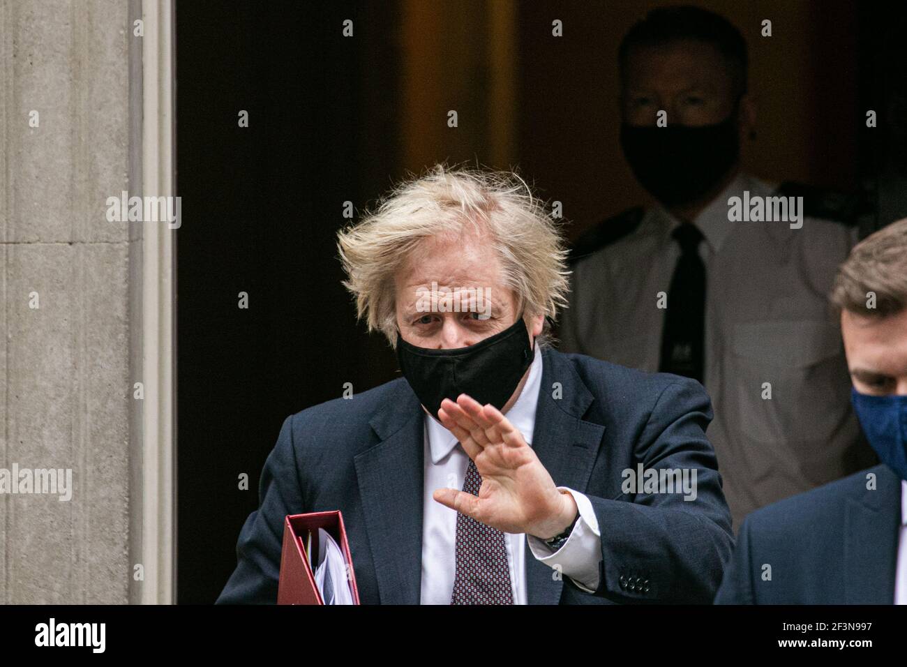 WESTMINSTER  LONDON, UK 17 March 2021. Prime Minister Boris Johnson departs from 10 Downing Street for Parliament to attend the weekly PMQs Prime Minister Questions as his government plans to introduce new powers to crack down on protests.  MPs have voted to pass the  Police, Crime, Sentencing and Courts Bill at  the second reading after two days of debate in the House of Commons. Credit amer ghazzal/Alamy Live News Stock Photo