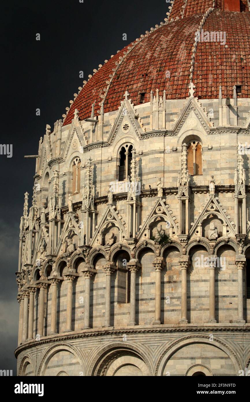 The Baptistry of St. John is a religious building in the Piazza dei Miracoli, a wide walled area in the centre of Pisa. Stock Photo