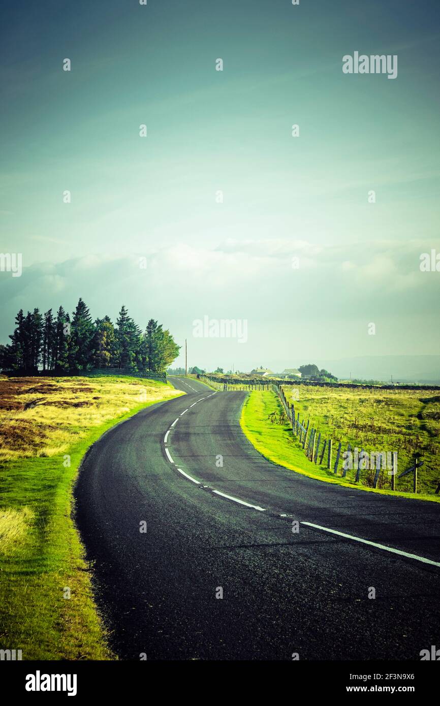 A winding rural road near Consett, County Durham, UK. Stock Photo