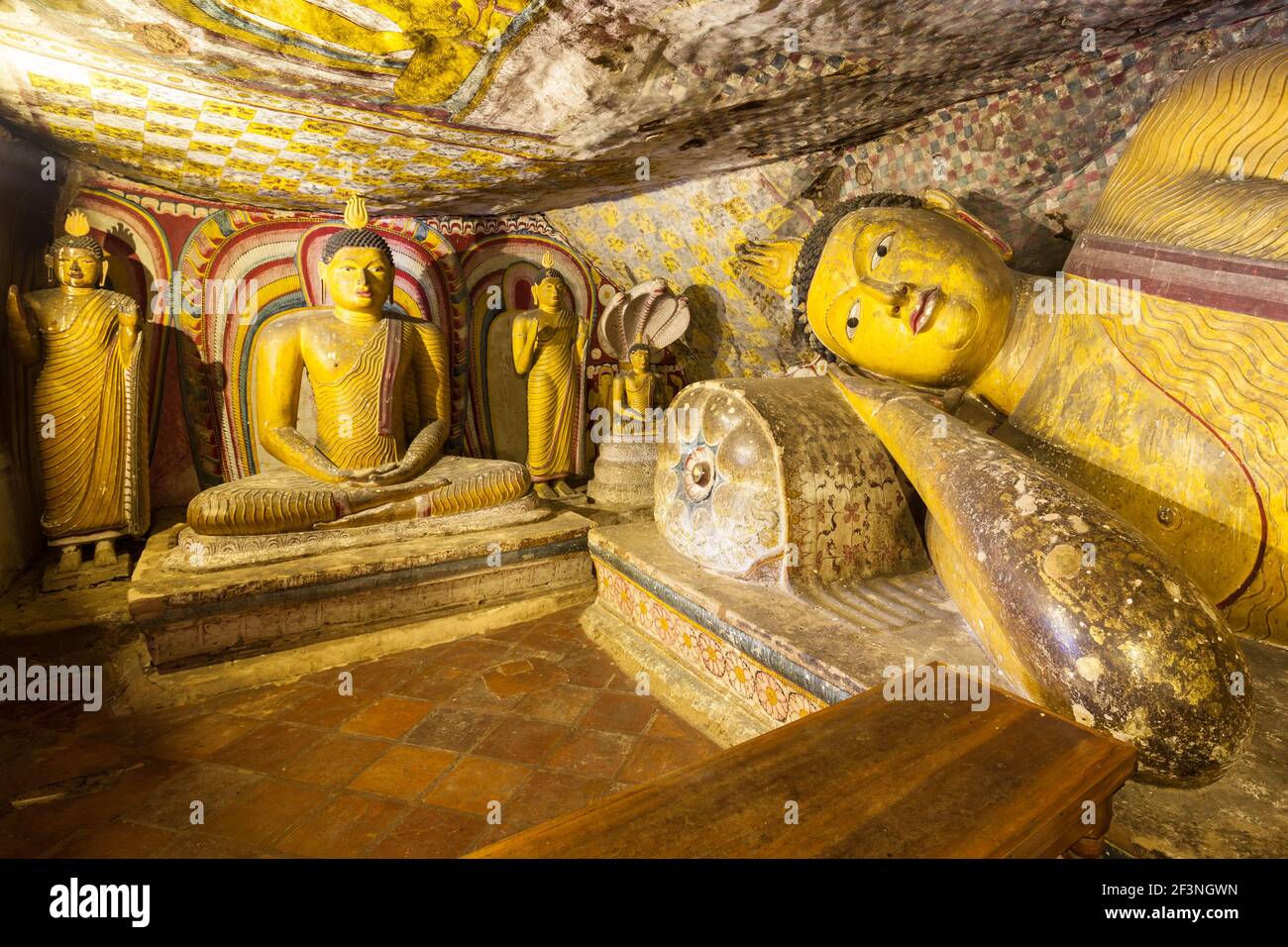 DAMBULLA, SRI LANKA - FEBRUARY 17, 2017: Sculpture of reclining Buddha inside Dambulla Cave Temple. Cave Temple is a World Heritage Site near Dambulla Stock Photo