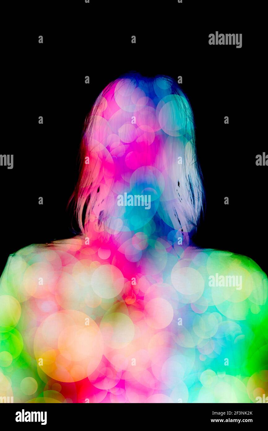 colourful silhouette of a woman head and shoulder Stock Photo