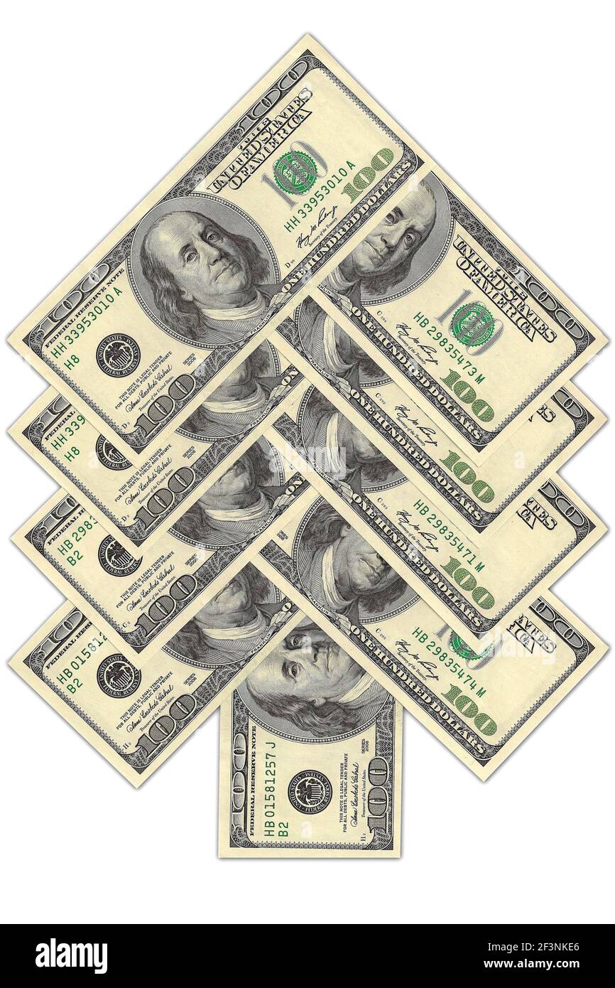 Christmas tree made of dollar bills isolated on white background Stock