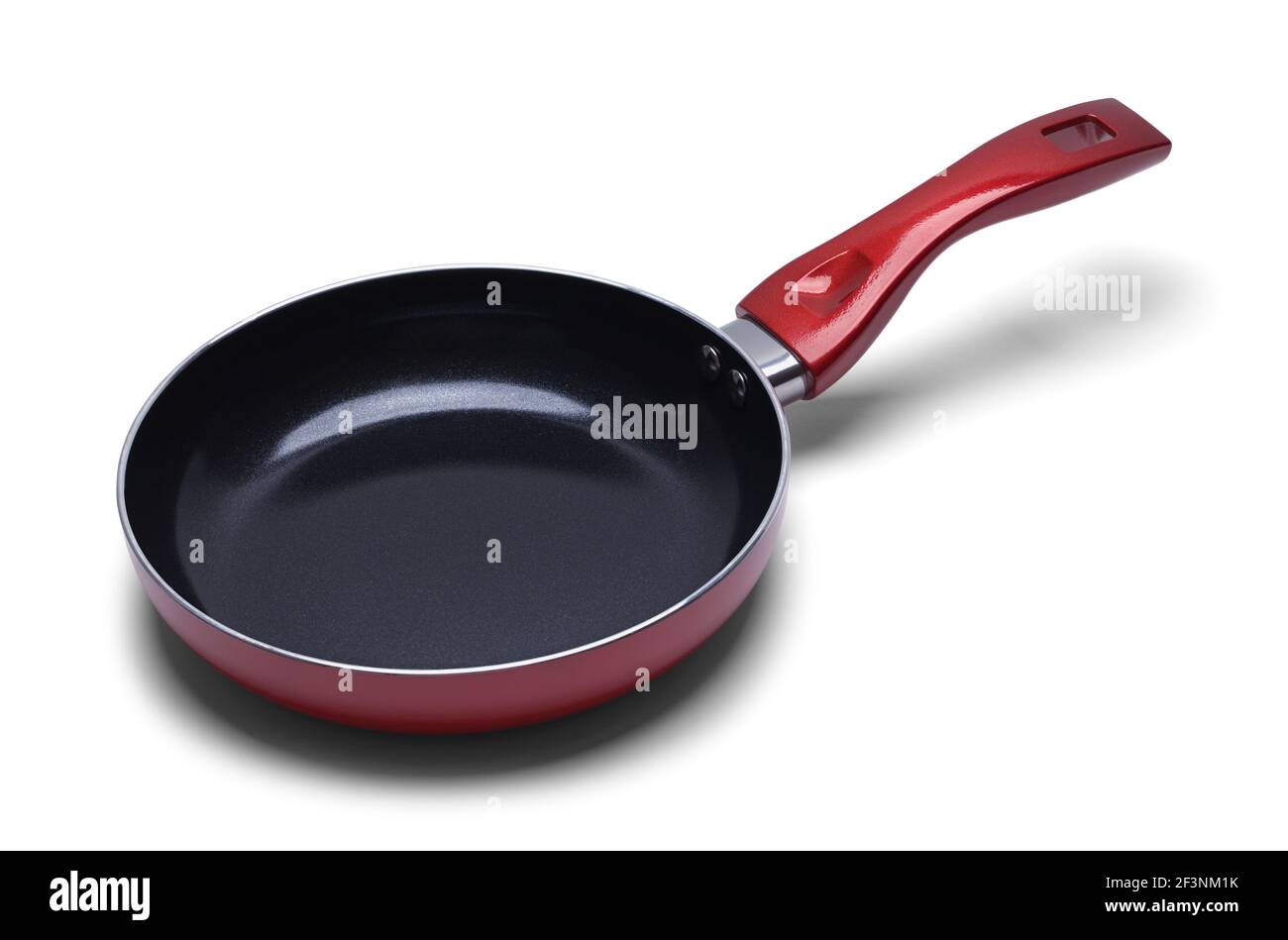 Empty Red Metal Frying Pan Cut Out. Stock Photo