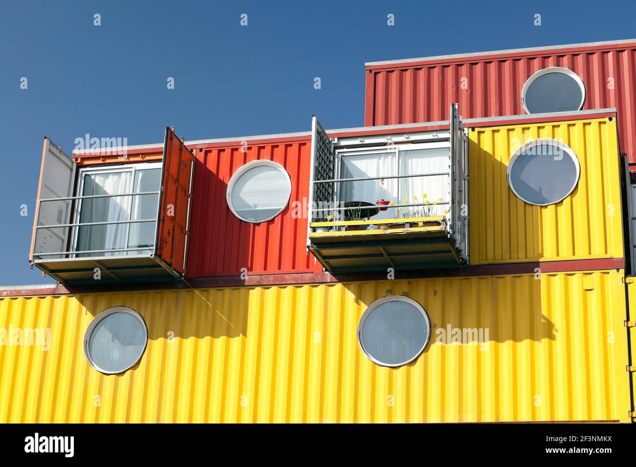 Colourful steel shipping containers at Container City 2, Trinity Buoy Wharf, East India Docks, London, E14. Stock Photo