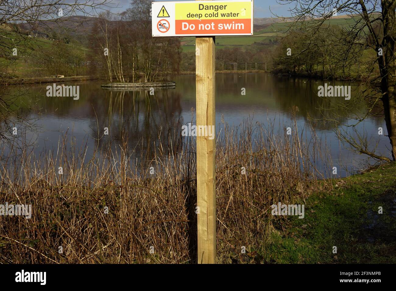 A Do Not Swim notice at Birch Vale Reservoir in Derbyshire Stock Photo