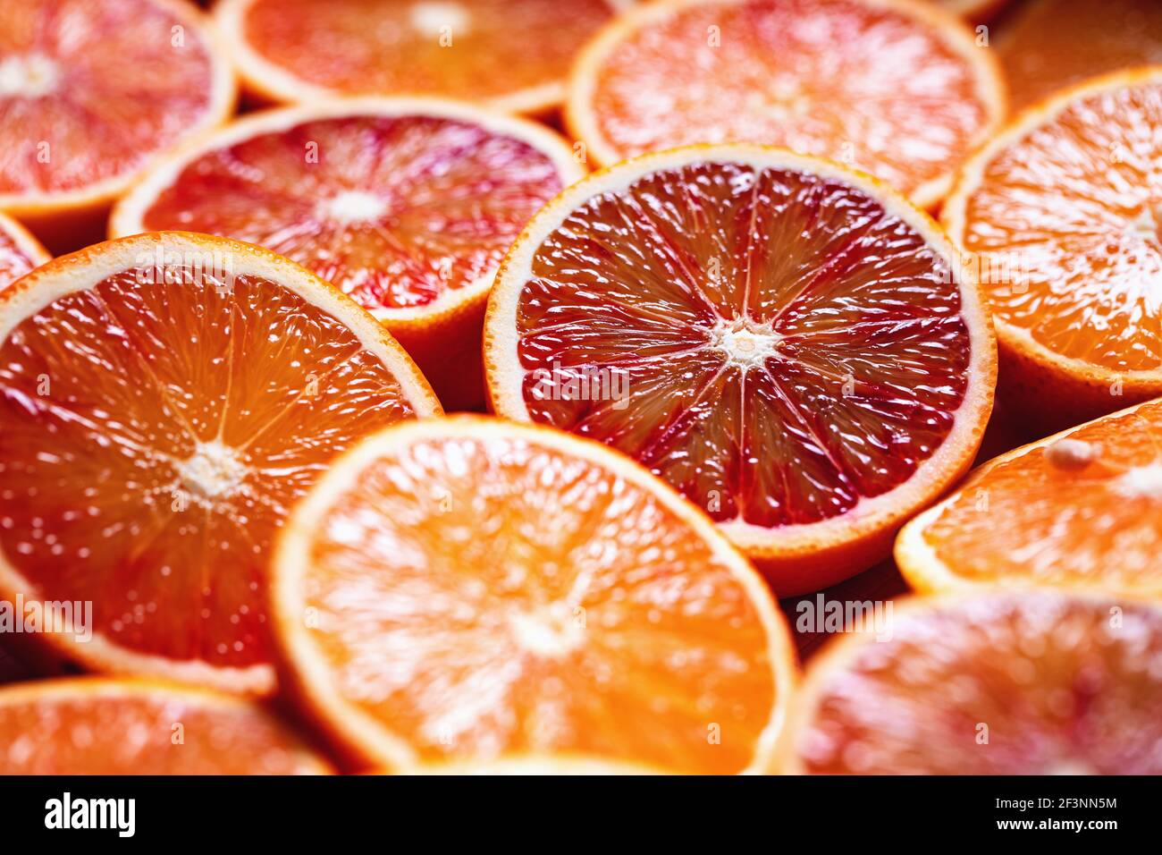 Sliced blood oranges, close up Stock Photo Alamy