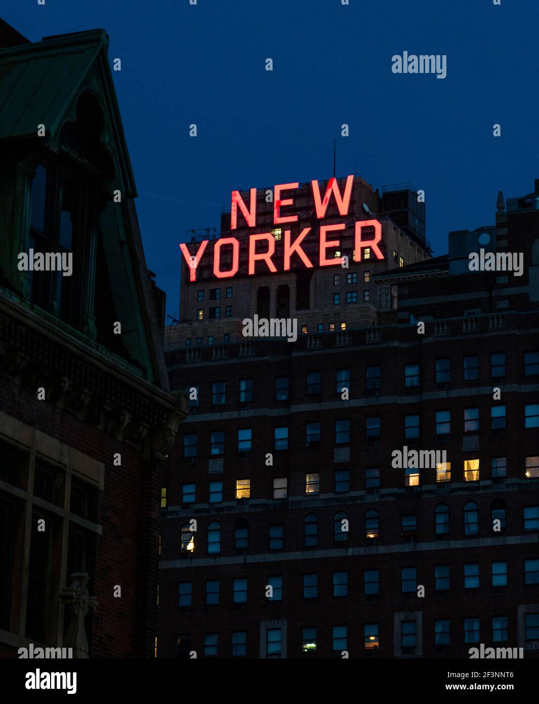 New Yorker Hotel neon sign at dusk. Stock Photo