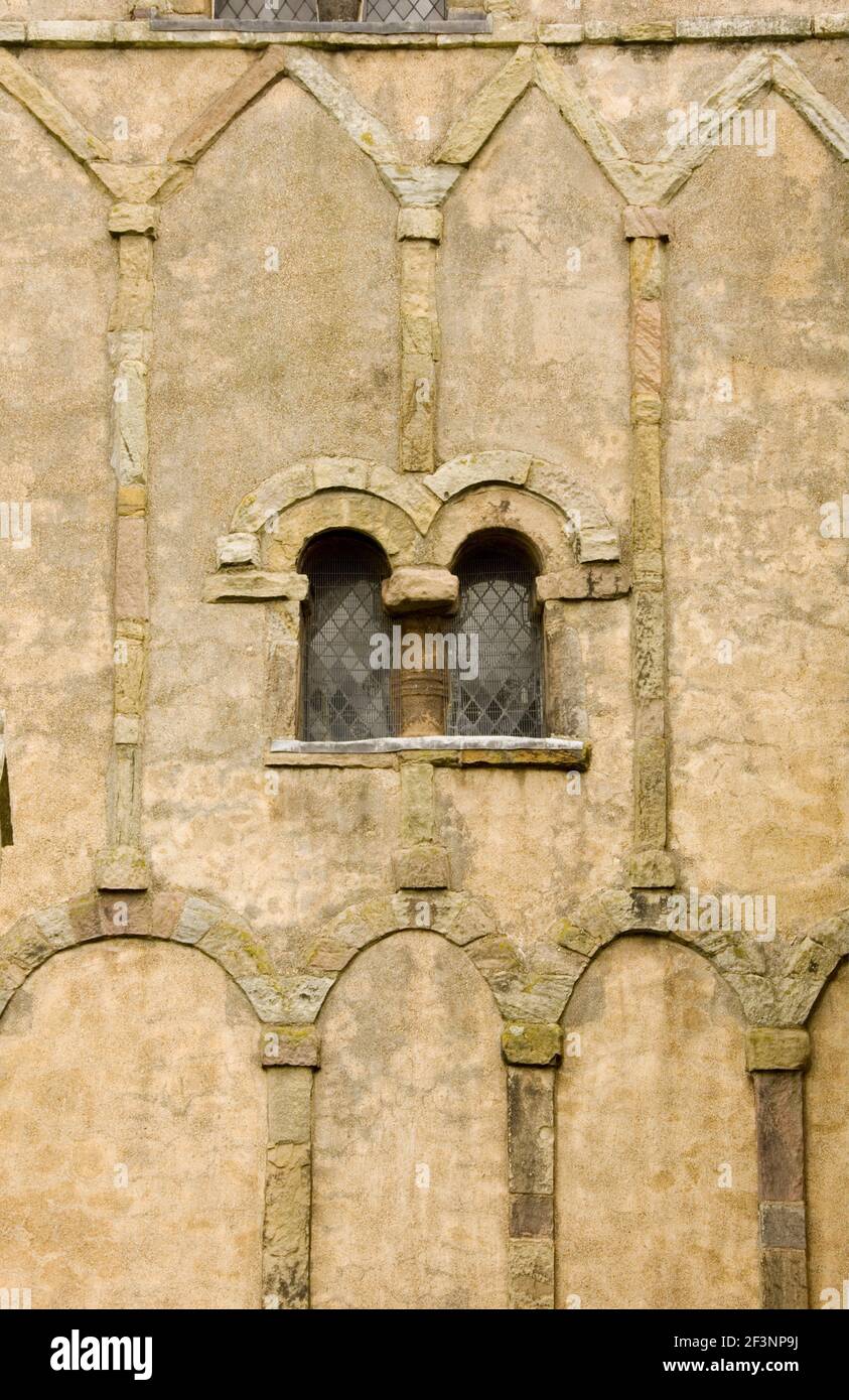 ST PETER'S CHURCH, Barton-upon-Humber, Lincolnshire. Architectural detail. Anglo-Saxon window and arcading in the south face of the tower. The strip-p Stock Photo