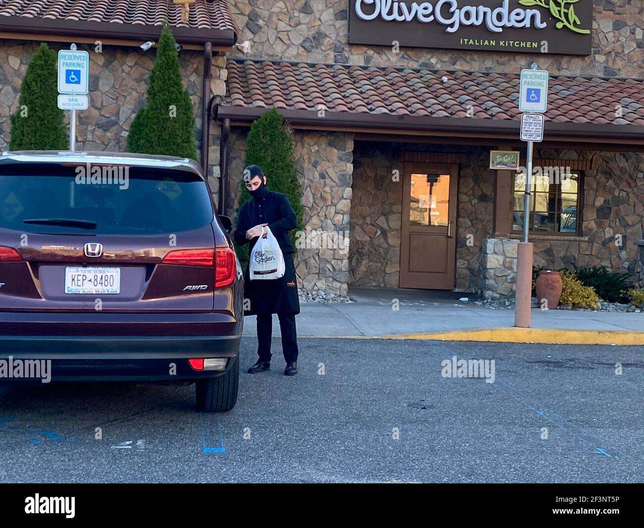 To Go parking only, outside Olive Garden Restaurant during Covid 19 Pandemic, Rego Center Mall, Queens, NY Stock Photo