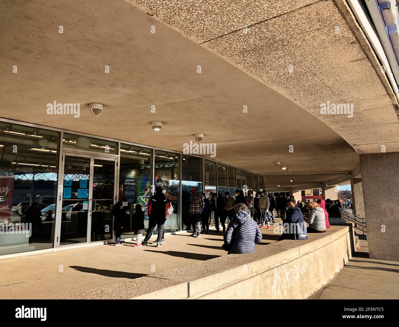 Long line outside Skechers Shoe Store during Pandemic on Black Friday, Rego  Park Mall, Queens, NY Stock Photo - Alamy