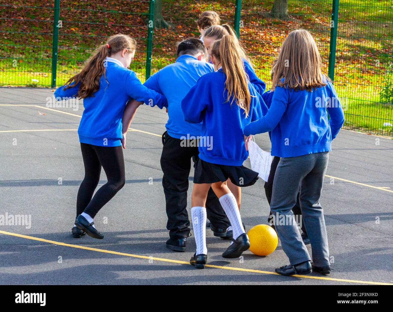 School girls playing football hires stock photography and images Alamy